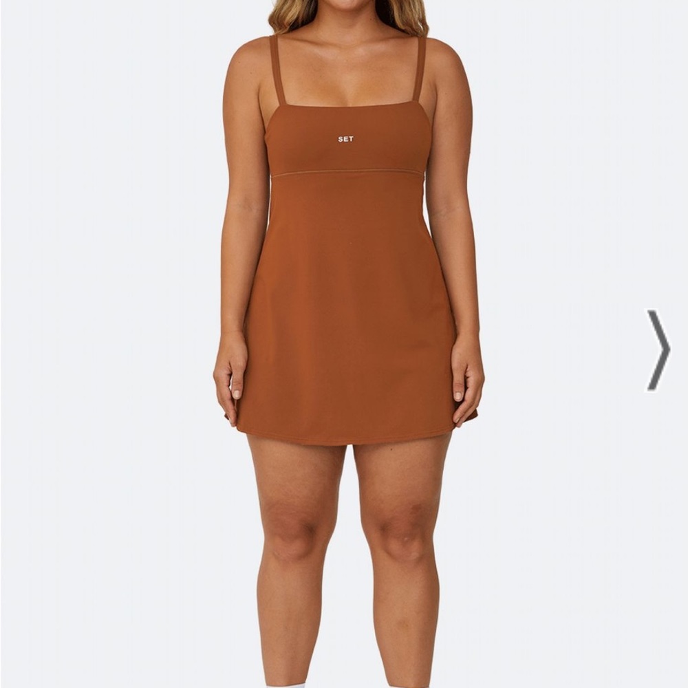 Worn once set active dress with built in shorts
